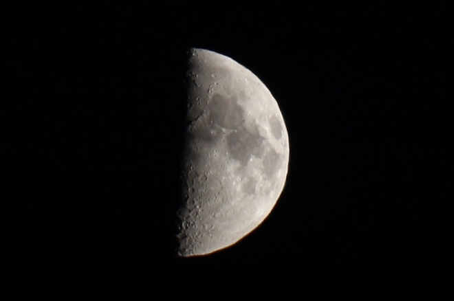 First quarter moon - 51% of full. Prince George, British Columbia Canada