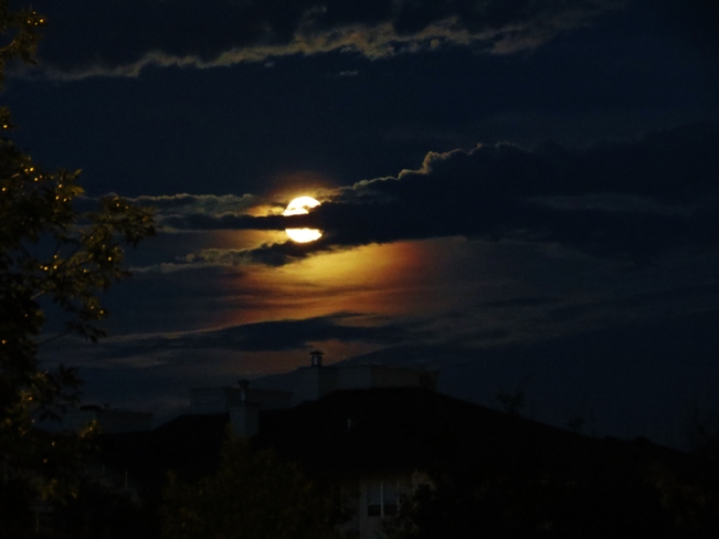 11pm moon in the clouds Edmonton, Alberta Canada