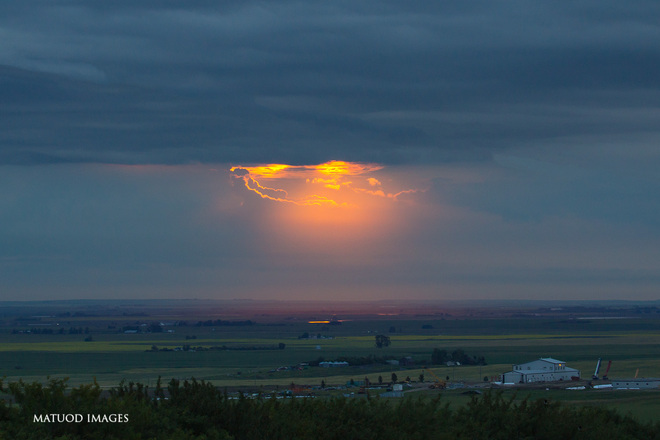 Clouds-sun-rayed Airdrie, Alberta Canada