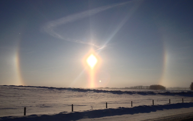 sun dogs on a cold winter day Sylvan Lake, Alberta Canada