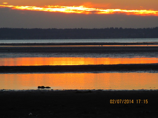 Sunset reflections Crescent Beach, British Columbia Canada