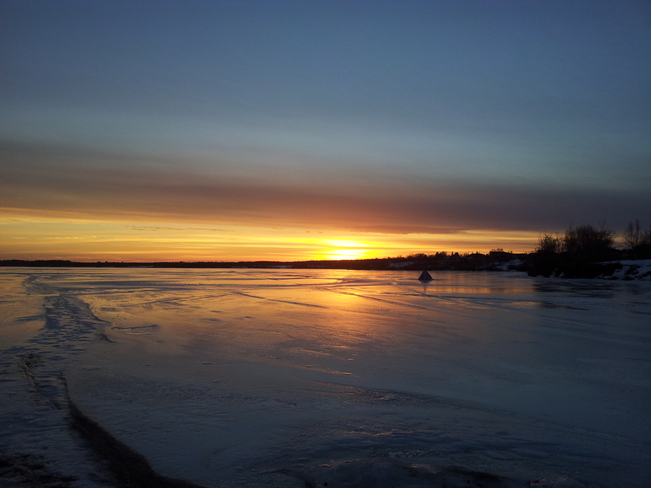 Sunset on the ice Richibucto, New Brunswick Canada
