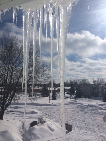 icicles are getting longer Cambridge, Ontario Canada