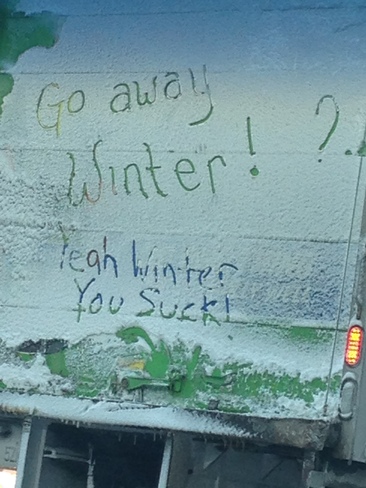 Message on back of Snow-laden truck in Toronto 