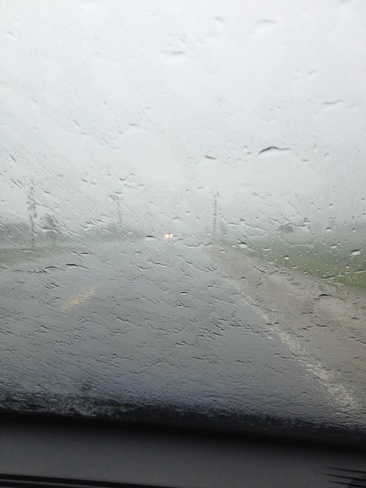 Pouring rain, Halts drivers Glen Allan, Ontario Canada