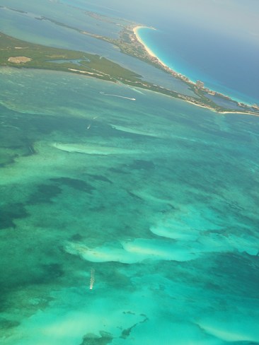 Flight from paradise. Cancún, Mexico & Manitoba