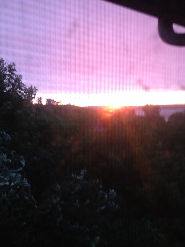 rain with a morning sunrise Kingscourt, Ontario Canada