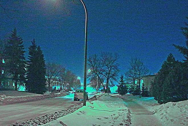 Street lights,cold and snow, and deserted sidewalks Winnipeg, MB