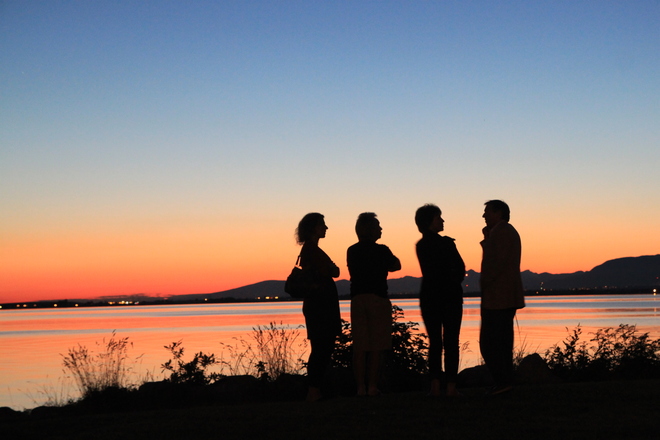 gathering at sunset White Rock, British Columbia Canada