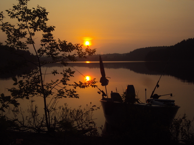 Sunset fishing on Macarthy Lake Elliot Lake, Ontario Canada