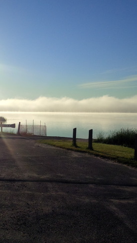 Rising fog South Porcupine, Ontario Canada