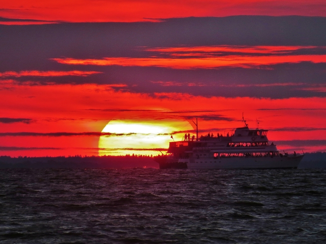 Chief Commanda II sails through nice sunset. North Bay, Ontario Canada