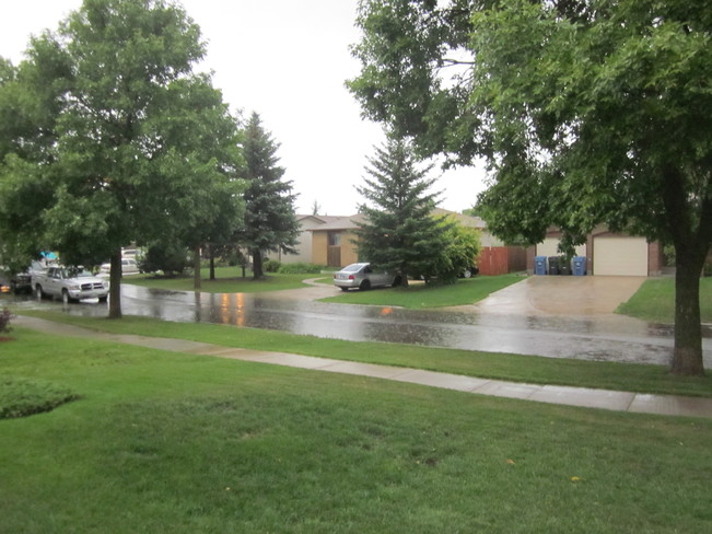 rain downpour Winnipeg, Manitoba Canada