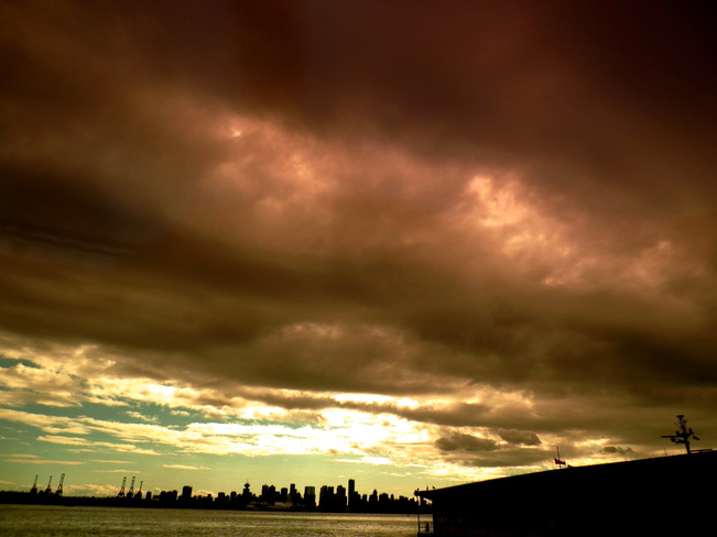 Sun Behind the Dark Clouds Greater Vancouver, British Columbia Canada