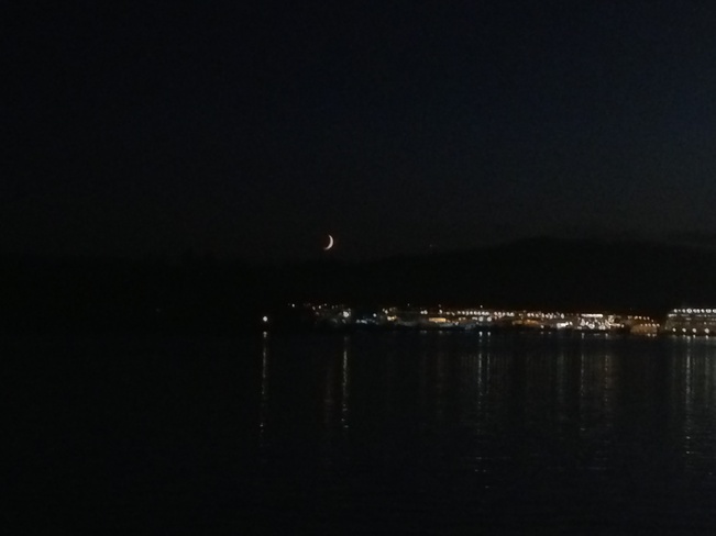 moon setting North Saanich, British Columbia Canada