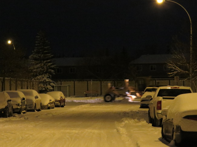 snow plows &parked cars Edmonton, Alberta Canada