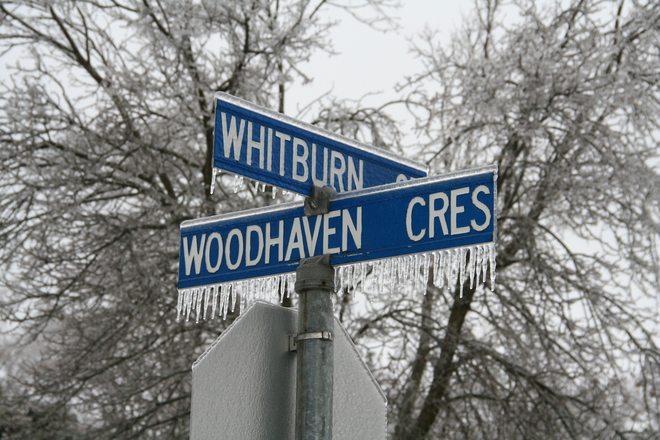 Street signs with ice Whitby, Ontario Canada