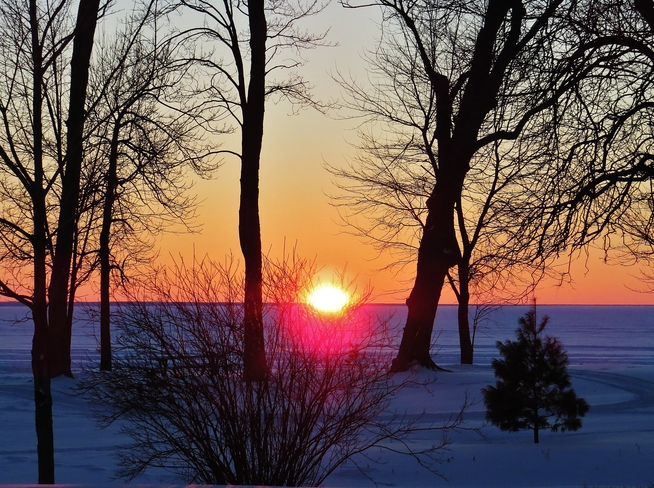 Christmas Eve sunset over Lake Nipissing. North Bay, Ontario Canada