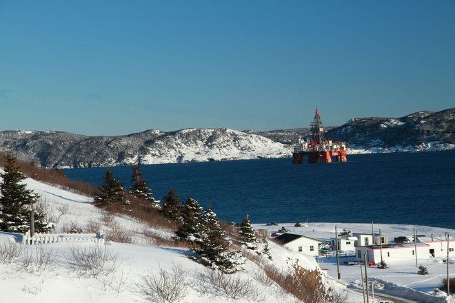 oil drilling rig heading out to see after Christmas Day's storm, as seen from Be Bell Island, Newfoundland and Labrador Canada