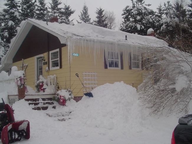 snow on roof O'Leary, Prince Edward Island Canada