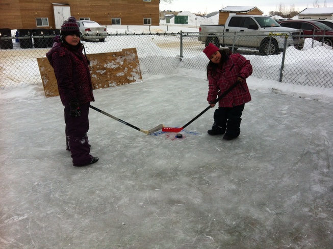 posing on cleared ice! Brandon, Manitoba Canada
