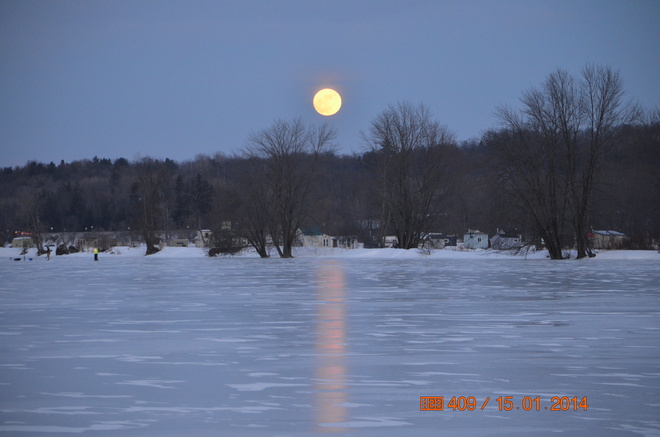 Moonrise and reflection Orleans, Ontario Canada