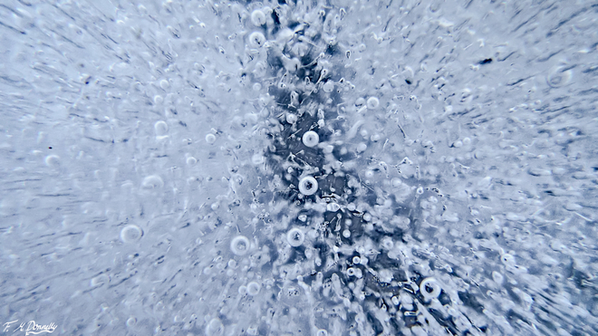 Air bubbles trapped in ice Smiths Falls, Ontario Canada
