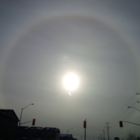 This looks cool. A rainbow around the sun Paris, Ontario Canada