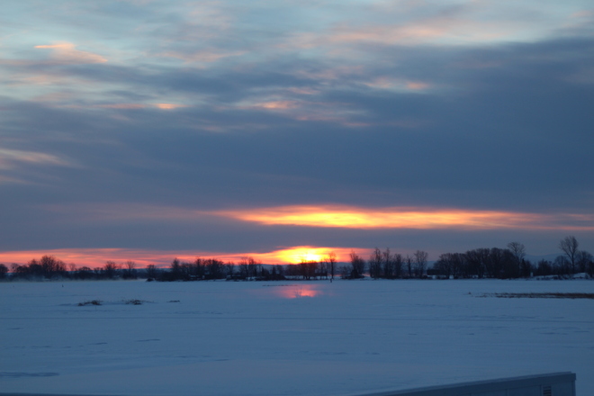 Winter sunrise on the St. Lawrence river Summerstown Station, Ontario Canada