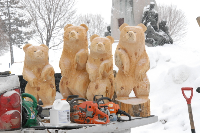 carving bears at winter carnival Orillia, Ontario Canada