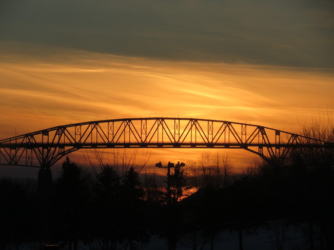 Sunset beyond Seaway International Bridge Cornwall, Ontario Canada