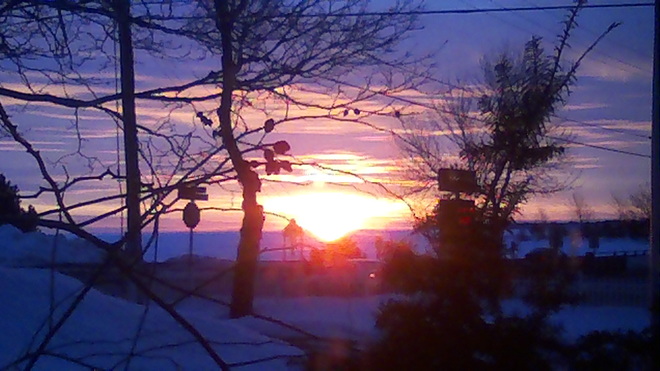 Sunrise over the frozen river Bouctouche, New Brunswick Canada
