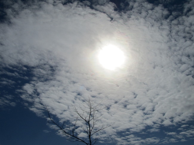 Sun filtering clouds Vernon, British Columbia Canada
