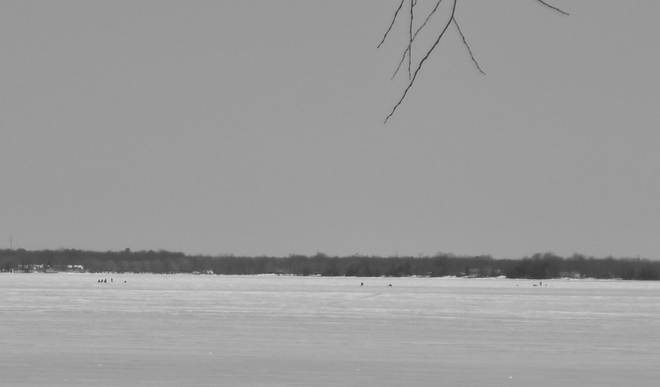 Black Dots of the ice are People Orillia, Ontario Canada