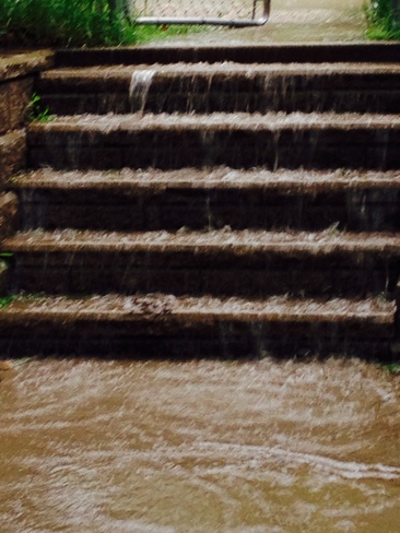Flowing Water on Stair/Walk Way Brandon, Manitoba Canada