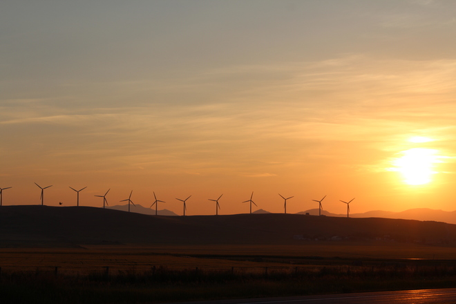 sunset behind Cowley Ridge Wind Turbines Lundbreck, AB