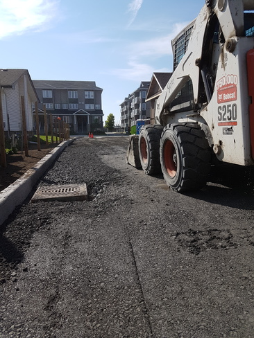 preparation for asphalt on a very hot day in ottawa Ottawa, ON