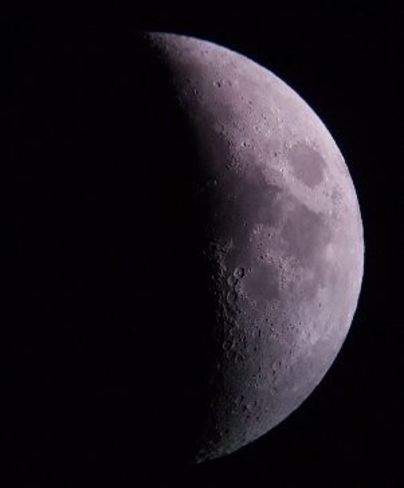 The moon through the eyepiece of a telescope Saint John, NB
