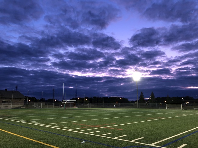 Purple sky over football field dollars-des-ormeaux,montreal,quebec