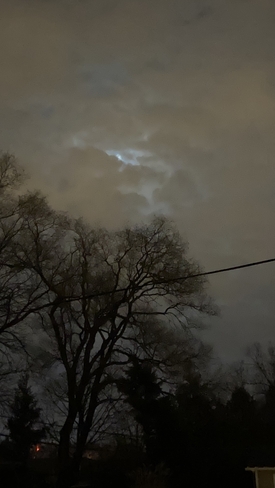 Remnants of Super Worm Moon behind Clouds Scarborough, Ontario | M1P 1R1