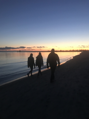 Sunset walk along Cobourg Beach Cobourg, Ontario, CA