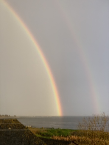 Thunder lightning Rain Double Rainbow Peach sky over the Atlantic Ocean Eastern Passage, Nova Scotia