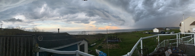 Thunder lightning Rain Double Rainbow Peach sky over the Atlantic Ocean Eastern Passage, Nova Scotia