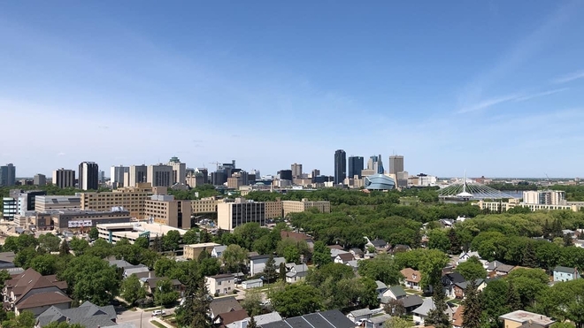 View of downtown Winnipeg from the rooftops of St. Boniface. Winnipeg, Manitoba, CA