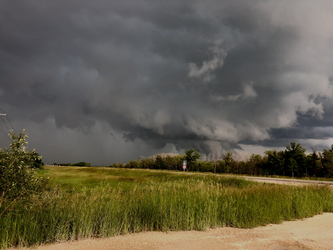 Supercell Wall Cloud forming "fingers" 4km northeast of Stonewall, MB Stonewall, MB