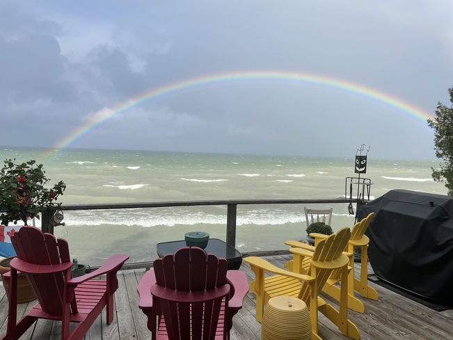 Beautiful rainbow in the middle of a storm Port Albert Beach, Ontario
