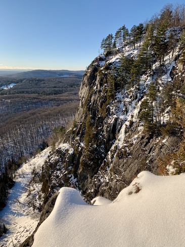 Snowshoeing to the Robertson Cliffs overlook Goulais River, Ontario, CA