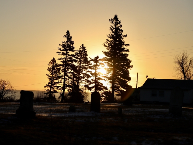 Sunrise on the cemetery. Northport, Nova Scotia, CA