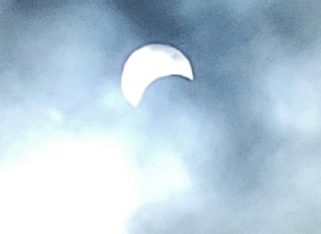cloudy eclipse in falls Niagara Falls, ON
